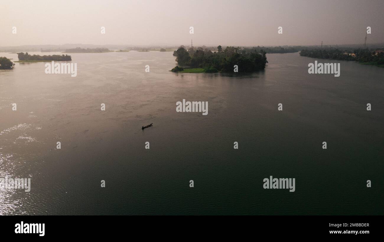 The aerial view of a boat on the sea with small islands Stock Photo - Alamy