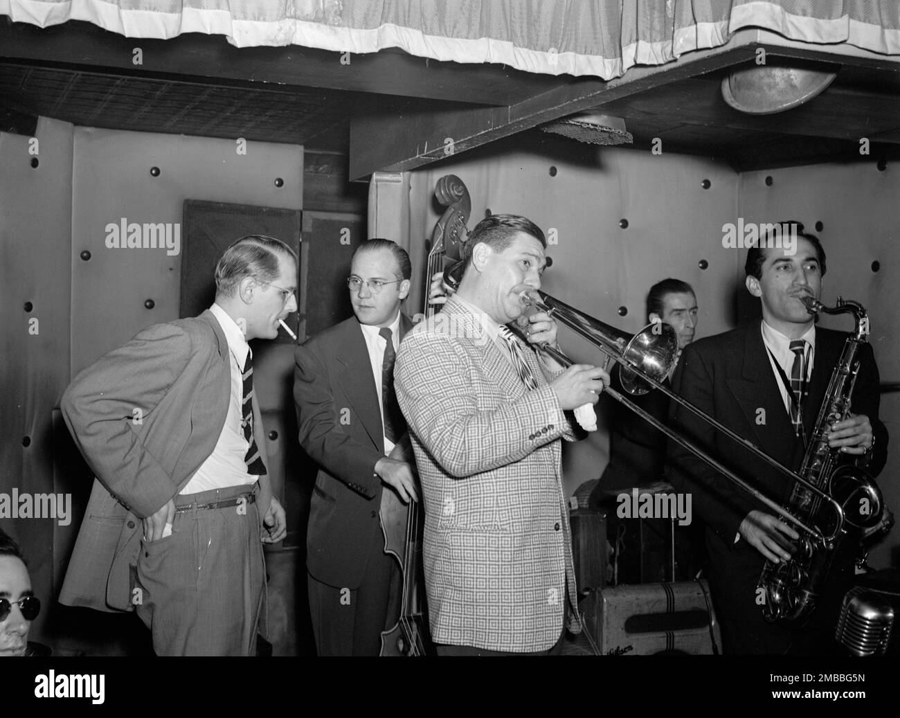 Portrait of Jack Teagarden, Bill Harris, Dave Tough, and Charlie Ventura, Three Deuces, New York, N.Y., 1946. Stock Photo