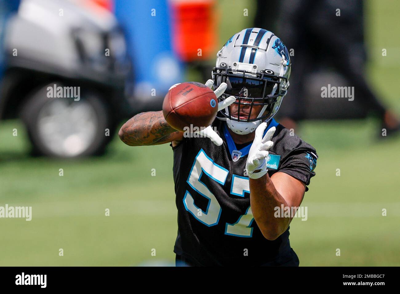 Carolina Panthers linebacker Damien Wilson catches a pass during NFL  football practice in Charlotte, N.C., Wednesday, June 1, 2022. (AP  Photo/Nell Redmond Stock Photo - Alamy