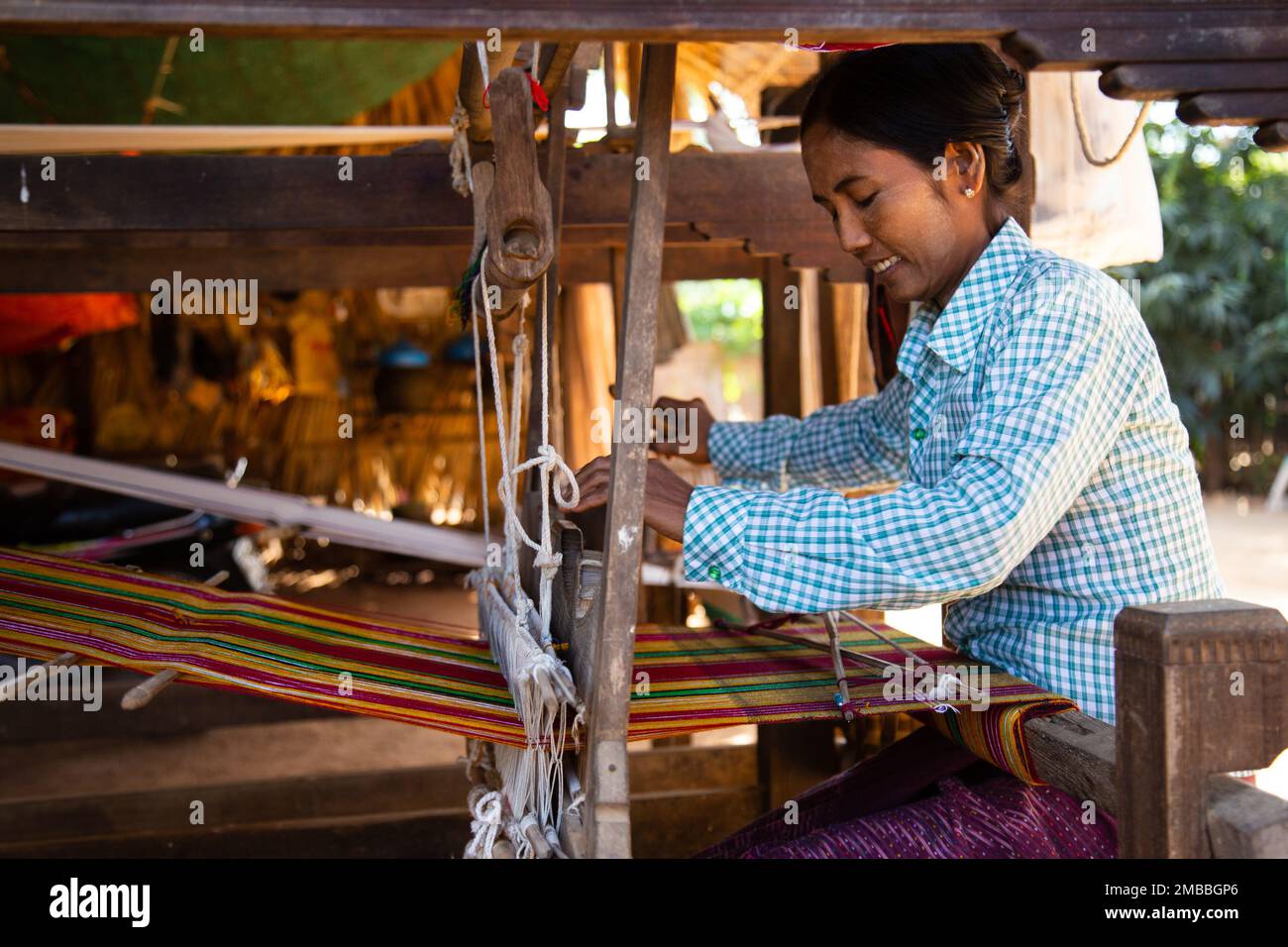 Fabric Production in Rural Village - Vibrant Colors - Myanmar Stock Photo