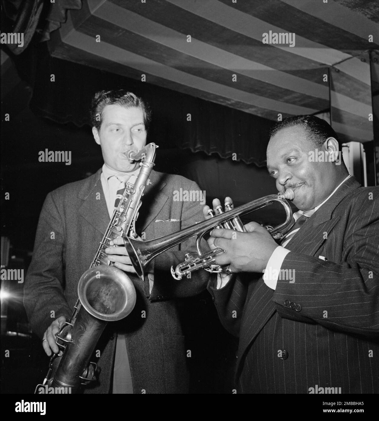 Portrait of Rex William Stewart and Charlie Barnet, Aquarium, New York, N.Y., ca. Aug. 1946. Stock Photo