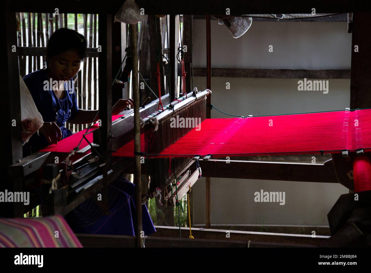 Fabric Production in Rural Village - Vibrant Colors - Myanmar Stock Photo