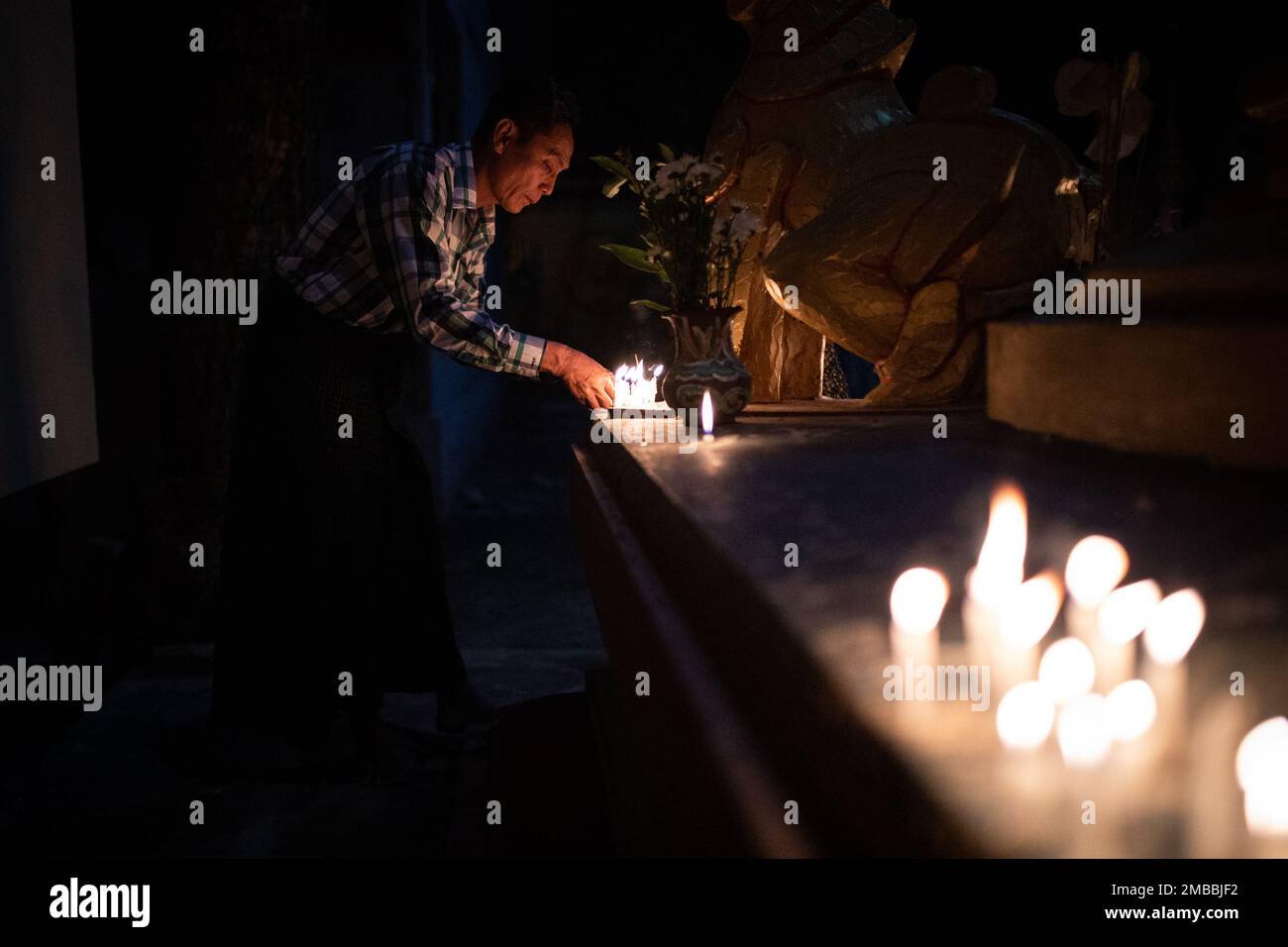 Portrait of Candle Light Prayer in Temple Myanmar Southeast Asia