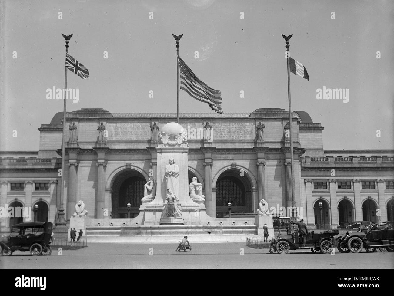 Flags - American, British, And French Flags in Front of Union Station, Awaiting Arrival of Balfour And Allied Commission, 1917. Stock Photo