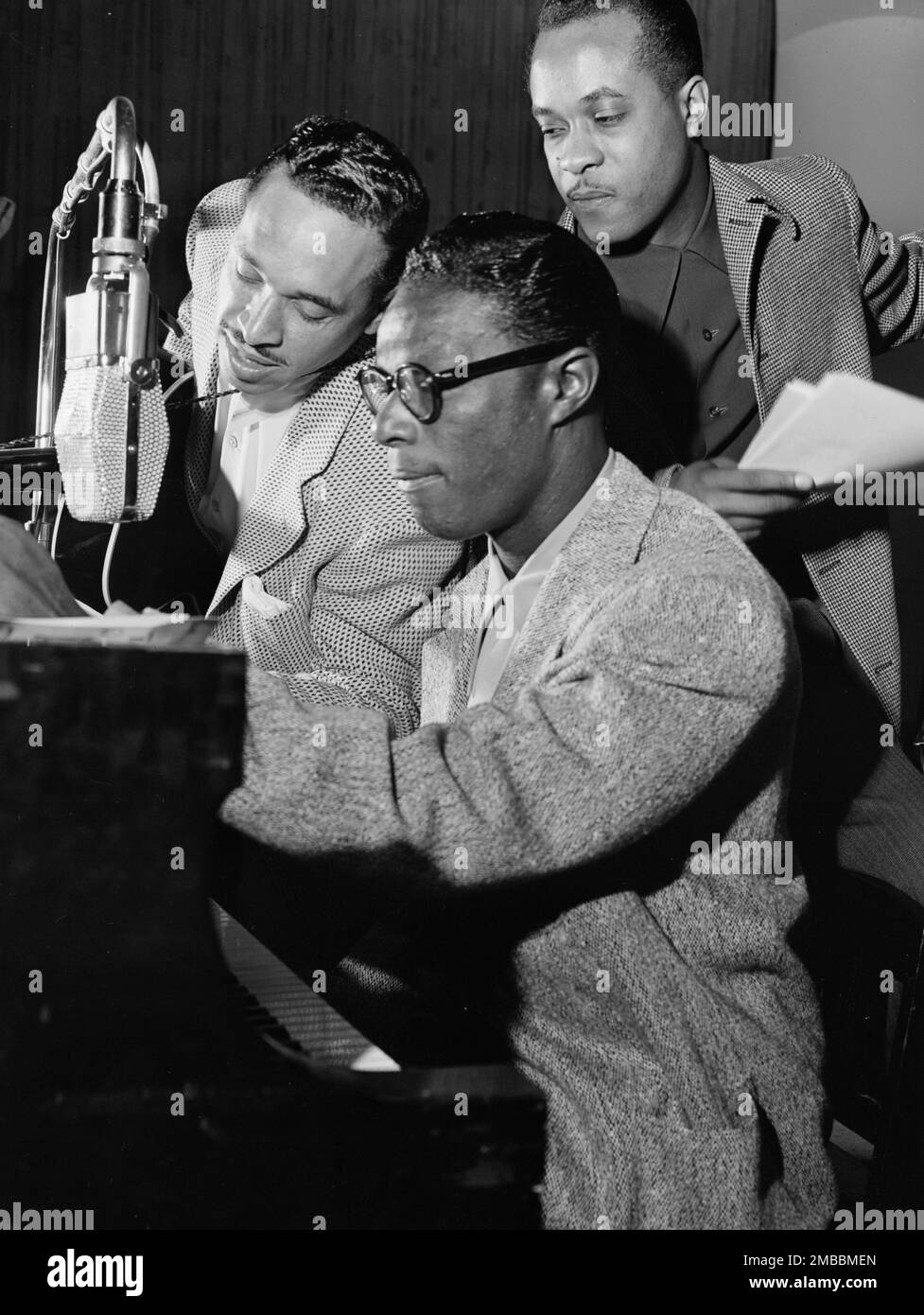 Portrait of Oscar Moore, Nat King Cole, and Wesley Prince, New York, N.Y., ca. July 1946. Stock Photo