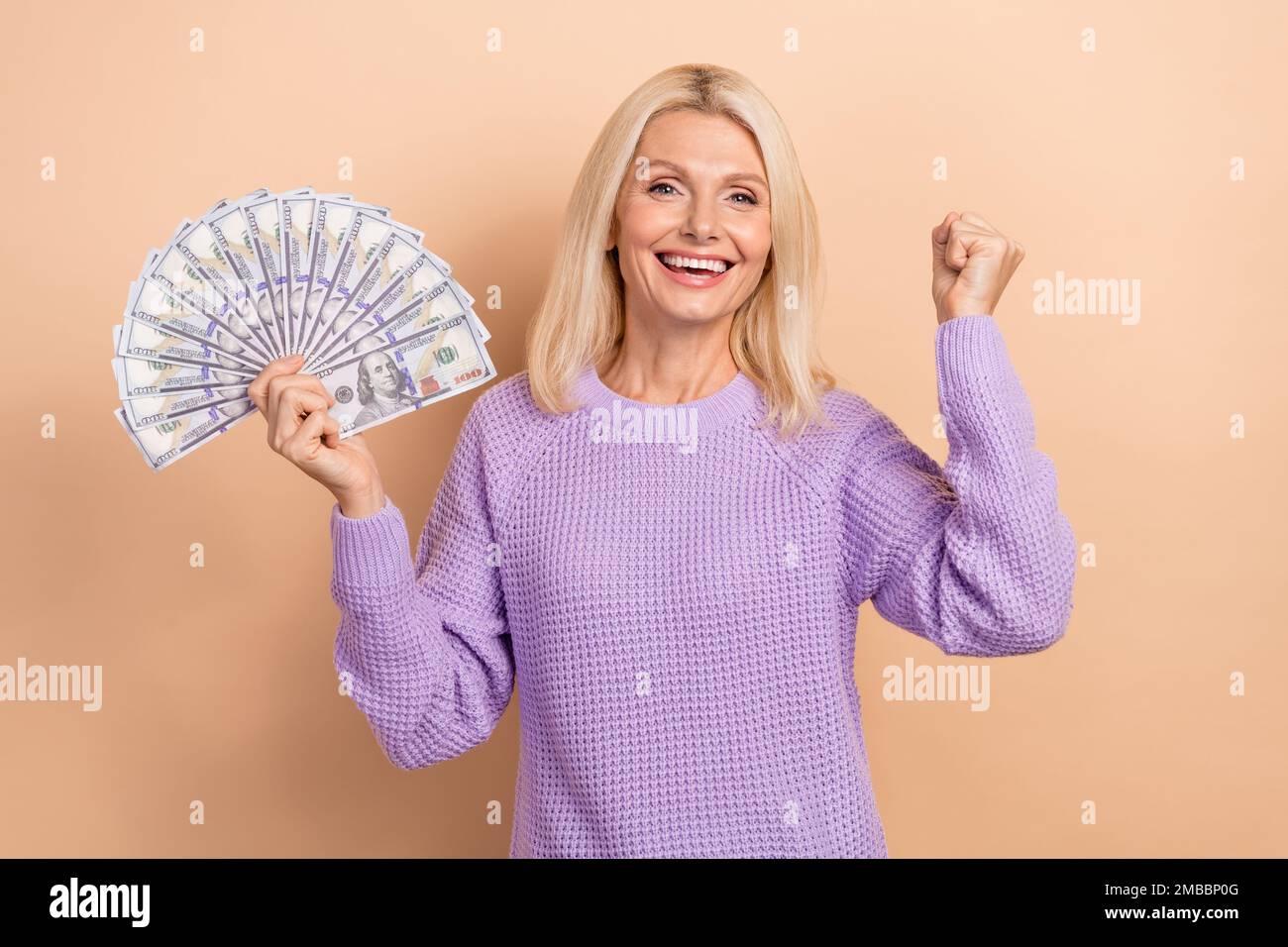 Mature woman fist up isolated hi-res stock photography and images - Alamy