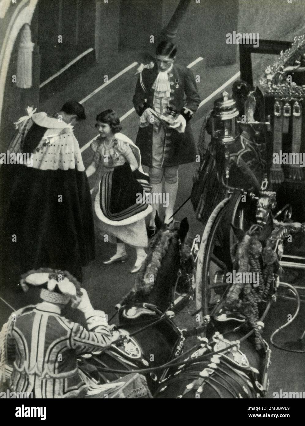 'Coronation Day', 12 May 1937, (1947). Princess Elizabeth (later Queen Elizabeth II) at the coronation of her father King George VI, at Westminster Abbey in London. The Duke of Norfolk, Earl Marshal of England, receives the princess.  From &quot;Princess Elizabeth: The Illustrated Story of Twenty-one Years in the Life of the Heir Presumptive&quot;, by Dermot Morrah. [Odhams Press Limited, London, 1947] Stock Photo