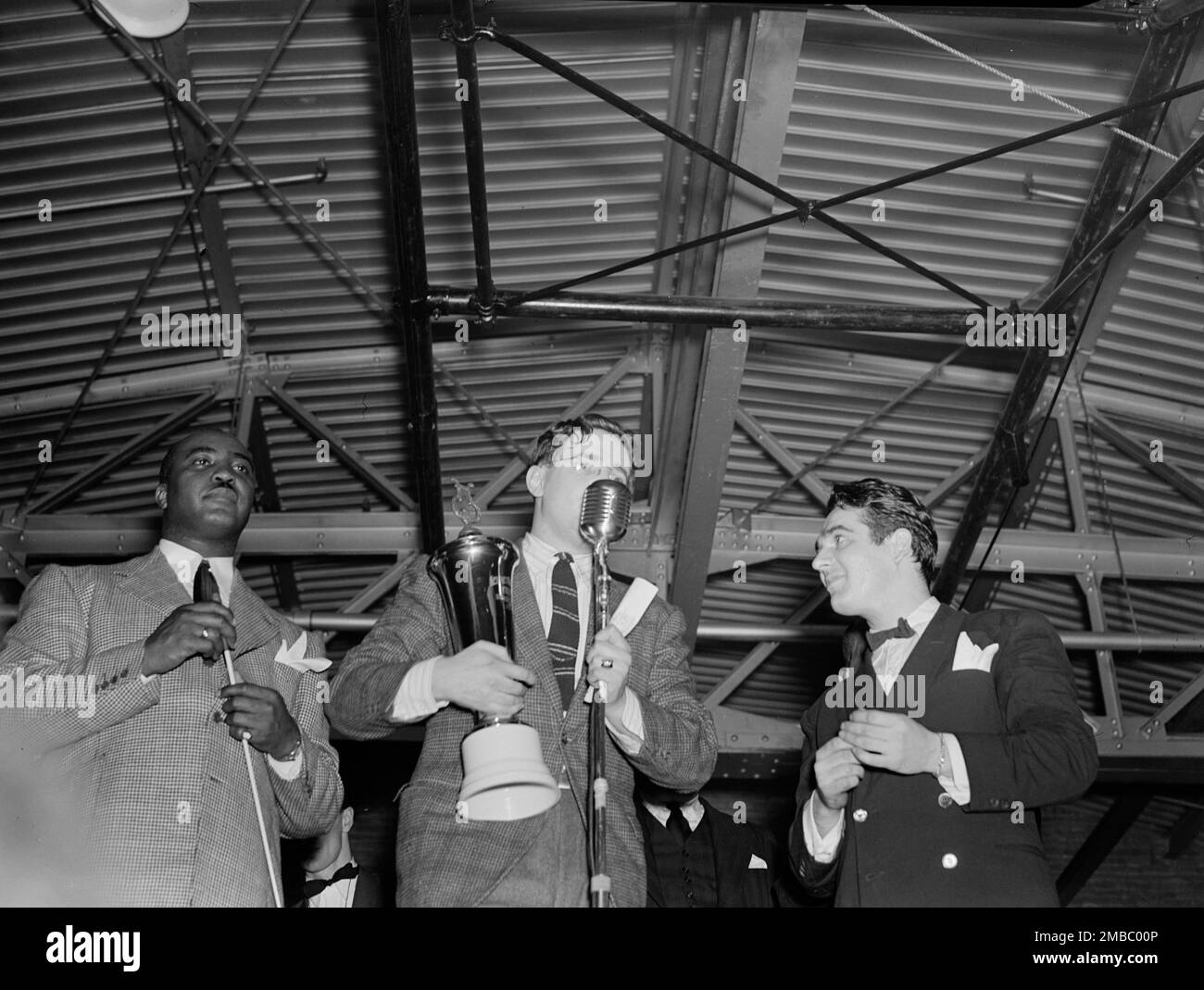 Portrait of Jimmie Lunceford, William P. Gottlieb, and Gene Krupa, Washington, D.C., ca. 1940. Stock Photo