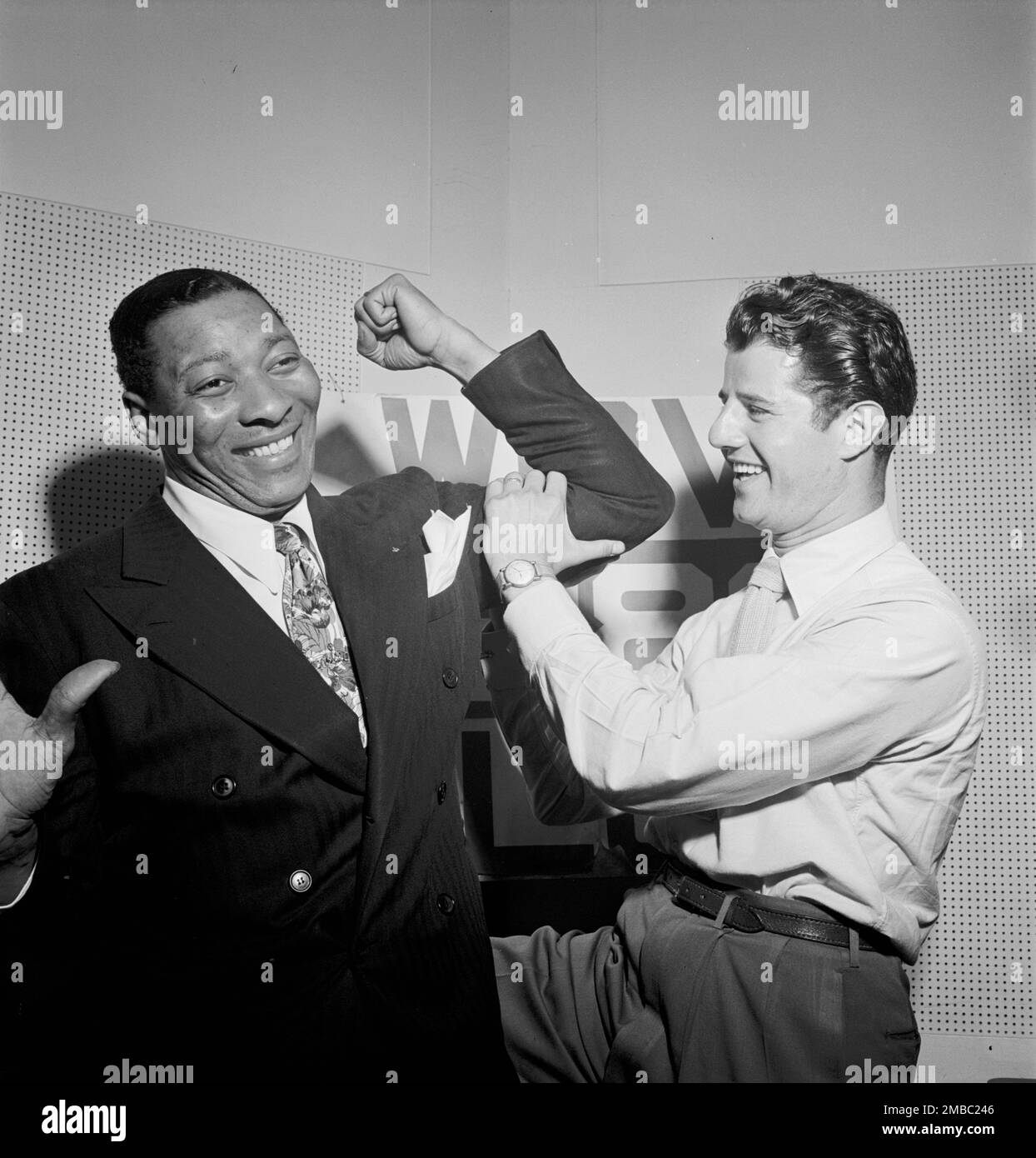 Portrait of Sid Catlett and Freddie Robbins, WOV office, New York, N.Y