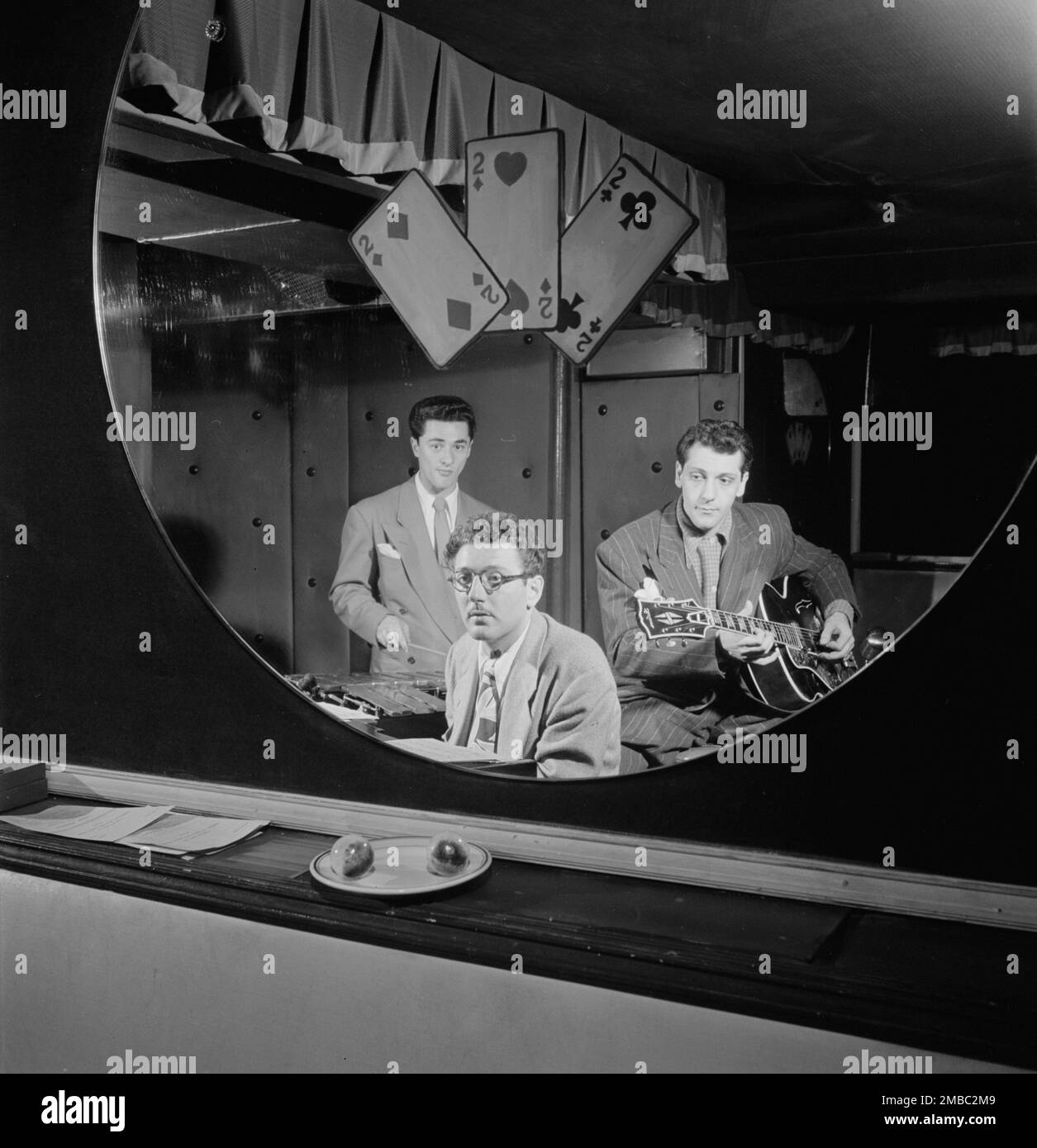 Portrait of Terry Gibbs, Harry Biss, and Bill (Buddy) De Arango, Three Deuces, New York, N.Y., ca. June 1947. Stock Photo