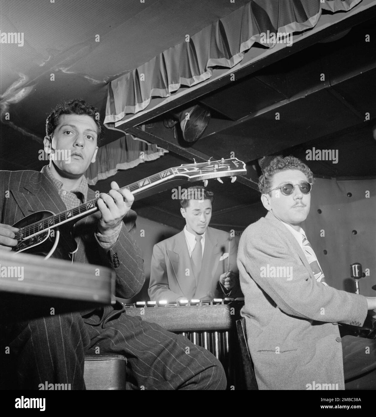 Portrait of Bill (Buddy) De Arango, Terry Gibbs, and Harry Biss, Three Deuces, New York, N.Y., ca. June 1947. Stock Photo