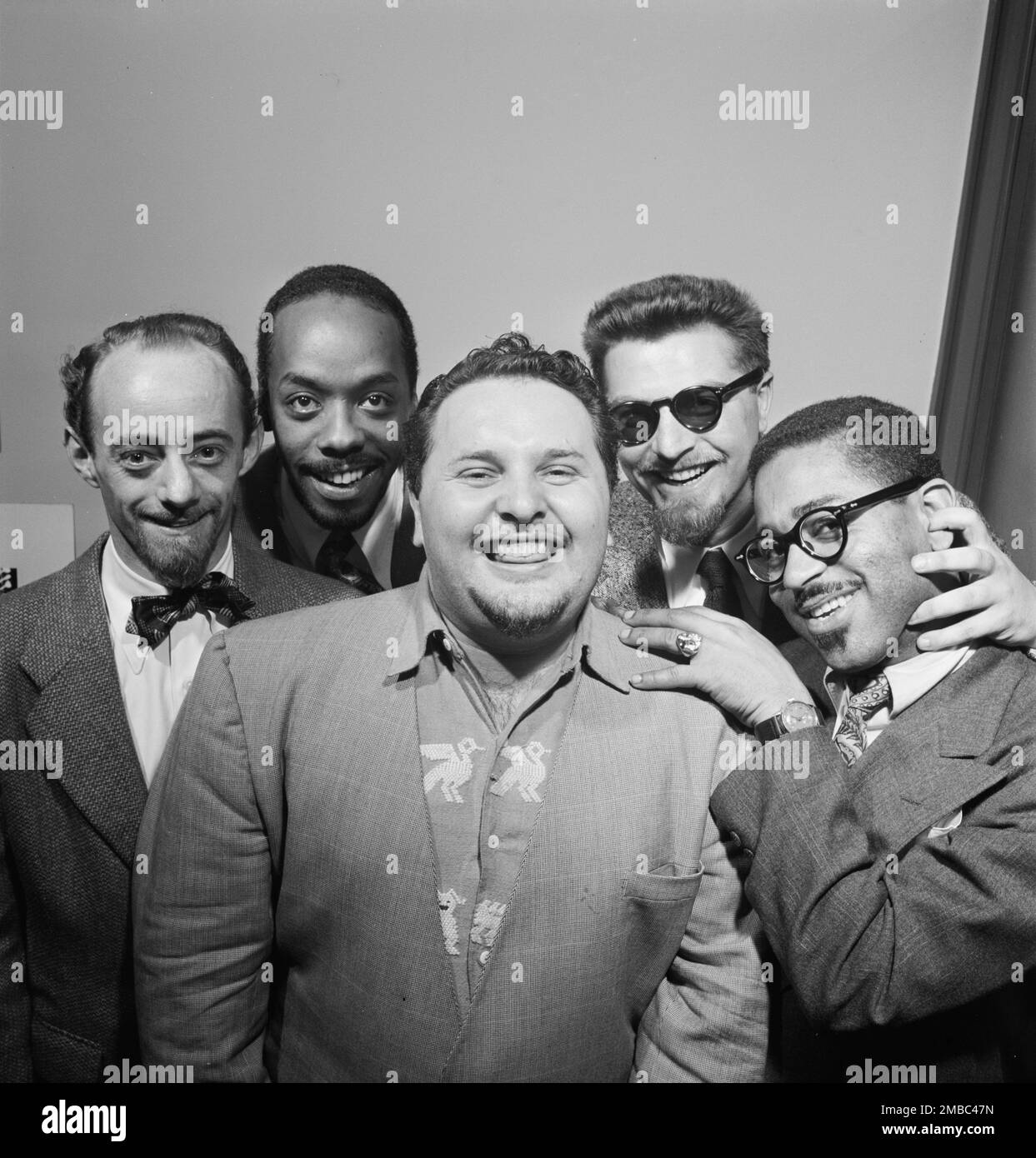 Portrait of Dave Lambert, John Simmons, Chubby Jackson, George Handy, and Dizzy Gillespie, William P. Gottlieb's office, New York, N.Y., ca. July 1947. Stock Photo