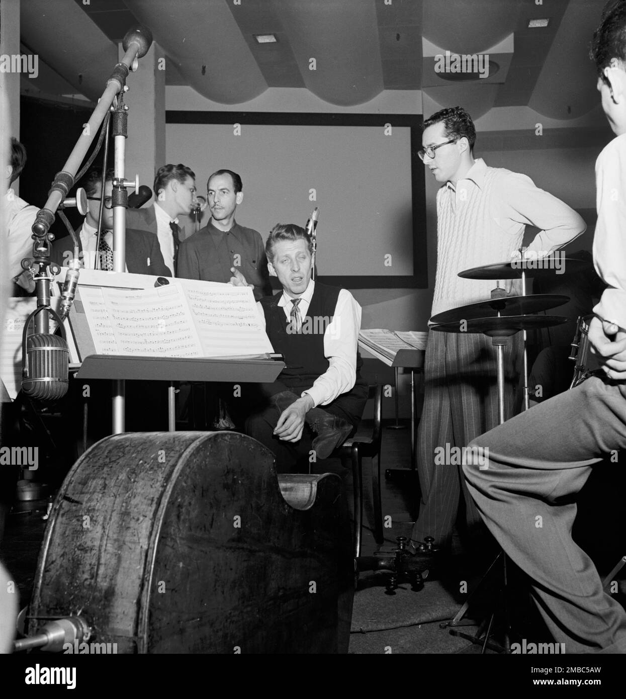 Portrait of Stan Kenton, Pete Rugolo, and Harry Forbes, Capitol studio, ca. Jan. 1947. Stock Photo