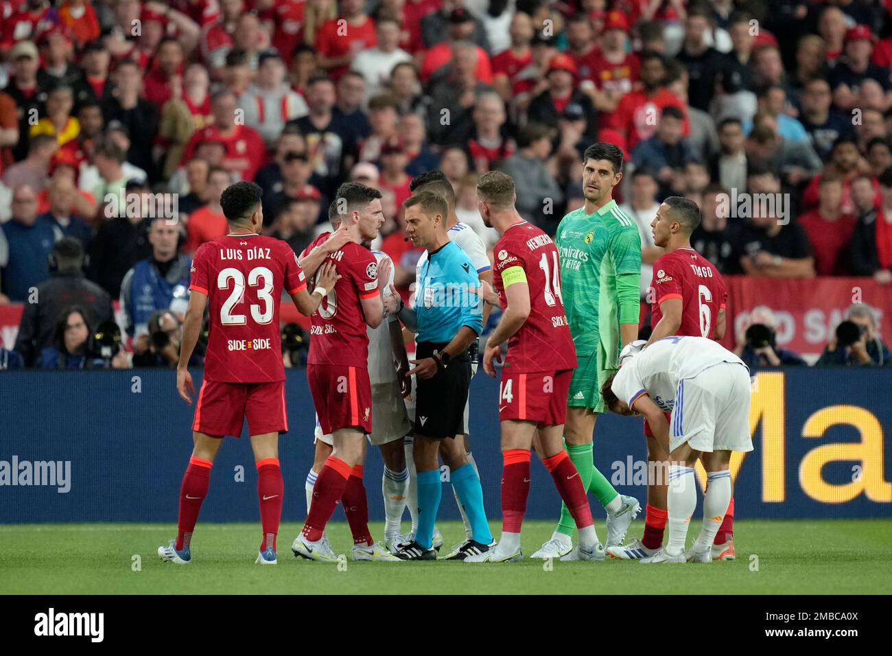 Liverpool's Andrew Robertson heads the ball during the Champions League  final soccer match between Liverpool and Real Madrid at the Stade de France  in Saint Denis near Paris, Saturday, May 28, 2022. (