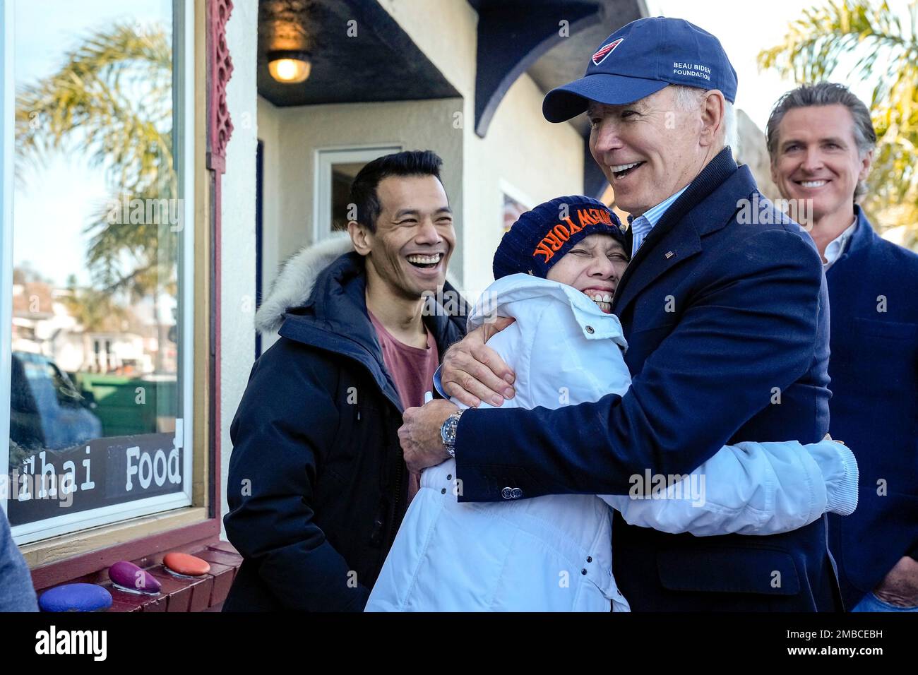 Capitola, United States Of America. 20th Jan, 2023. Capitola, United States of America. 20 January, 2023. U.S President Joe Biden, right, embraces a resident during a tour of areas damaged by freak rain storms as California Gov. Gavin Newsom, right, looks on, January 19, 2023 in Capitola, California. Credit: Adam Schultz/White House Photo/Alamy Live News Stock Photo