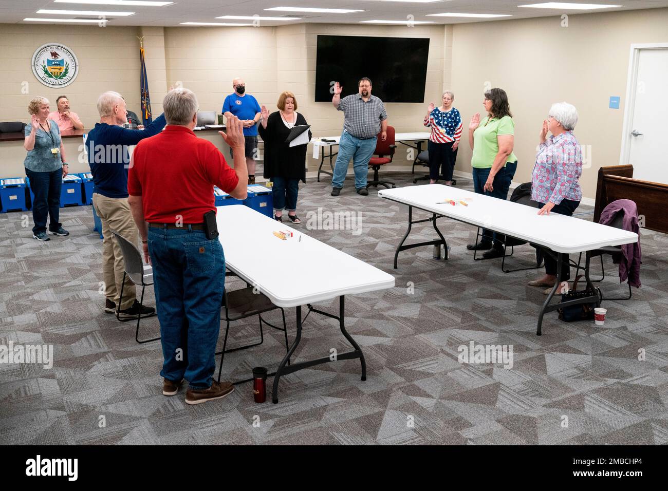 Election workers take an oath at the Montour County administration