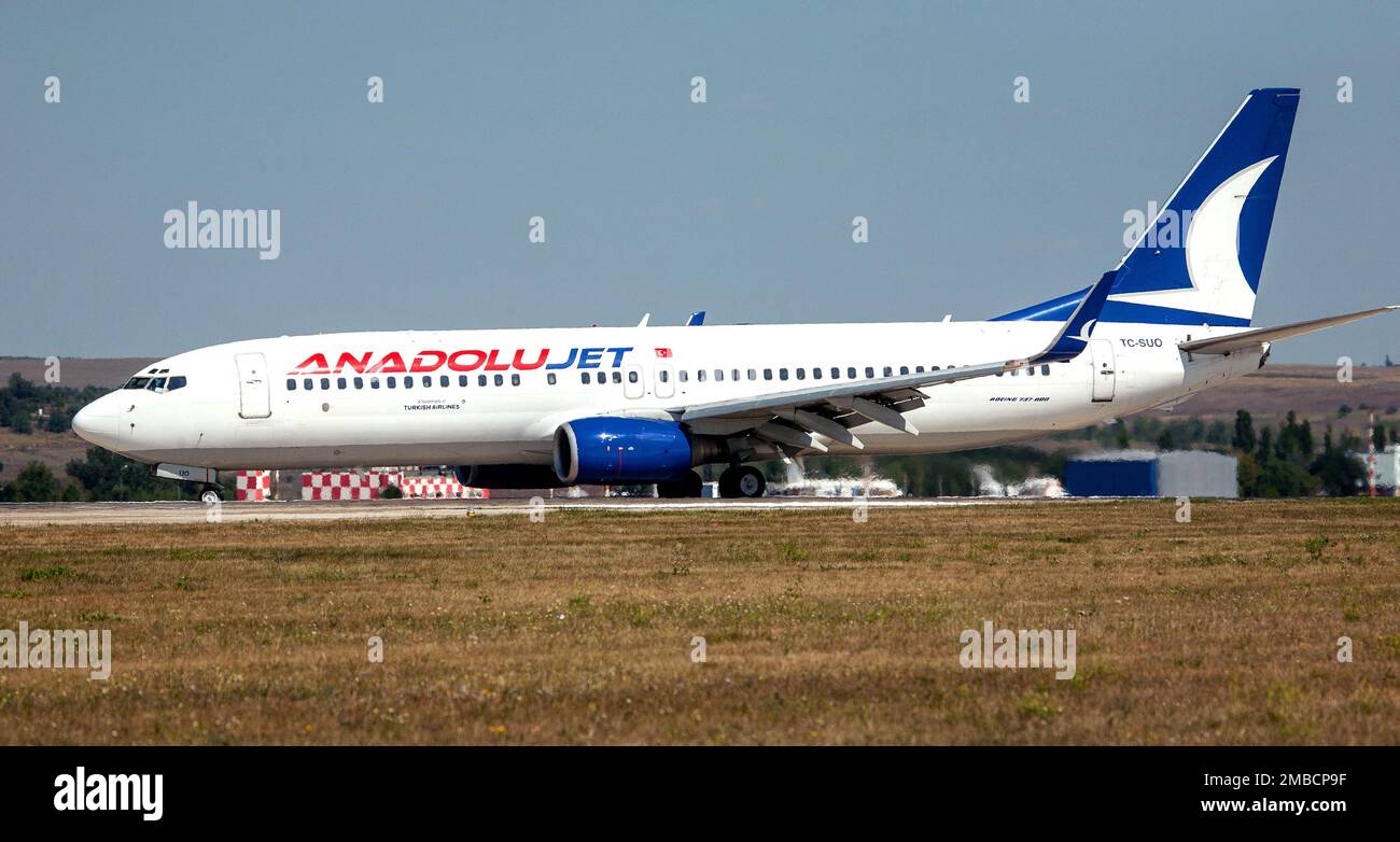 CHISINAU, MOLDOVA - AUGUST18: Turkish Anadolu Jet Boeing 737-700  take off on August 18, 2014 in Chisinau,Moldova. Stock Photo