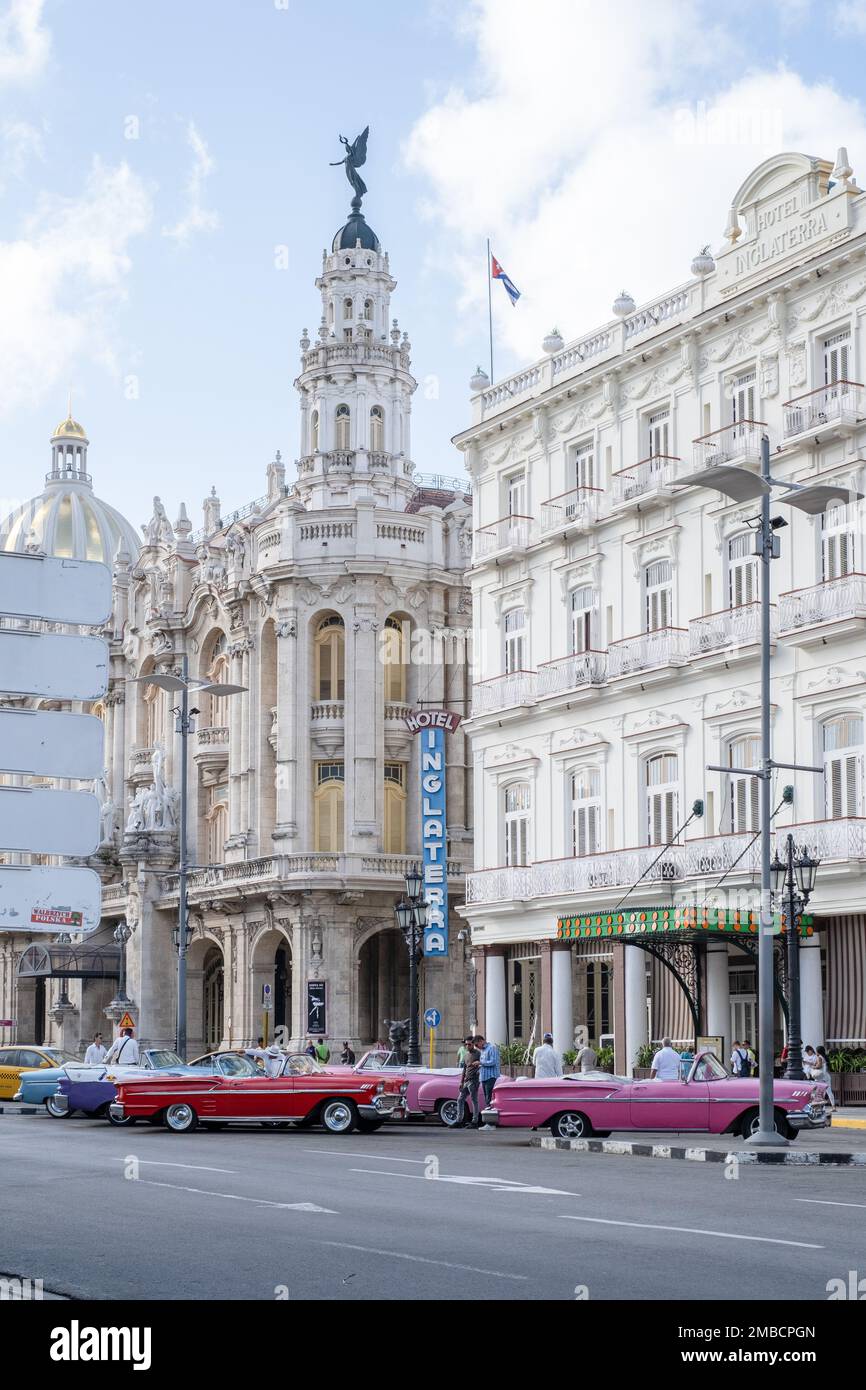 Gran Teatro de La Habana "Alicia Alonso", Grand Theater of Havana, and the Hotel Inglatera with open top vintage cars outside, Havana, Cuba Stock Photo