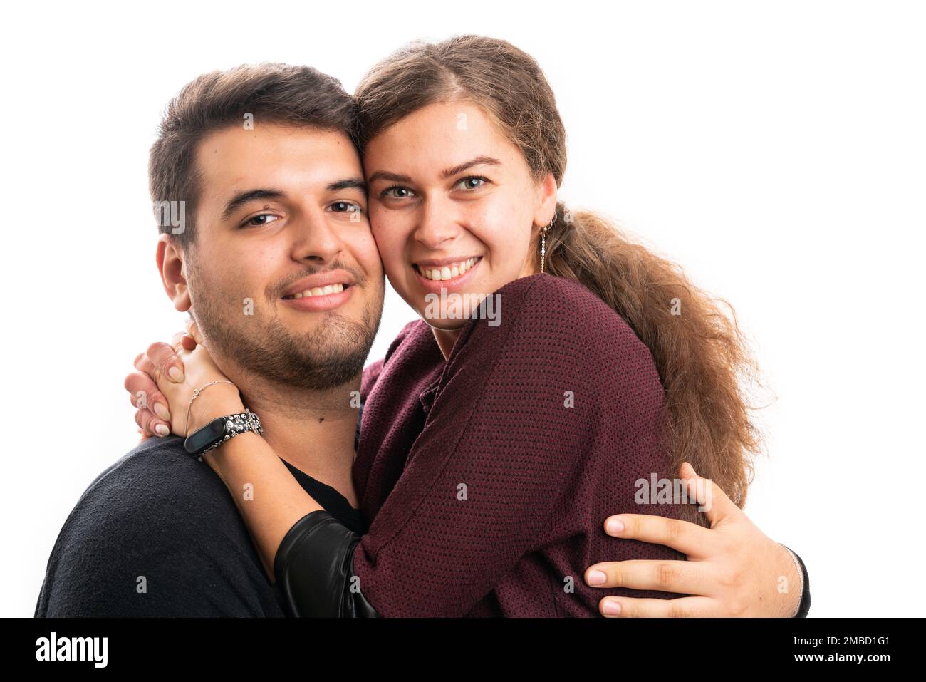 Cheerful adult man and woman couple close-up boyfriend girlfriend portrait hugging as romantic concept isolated on white studio background Stock Photo
