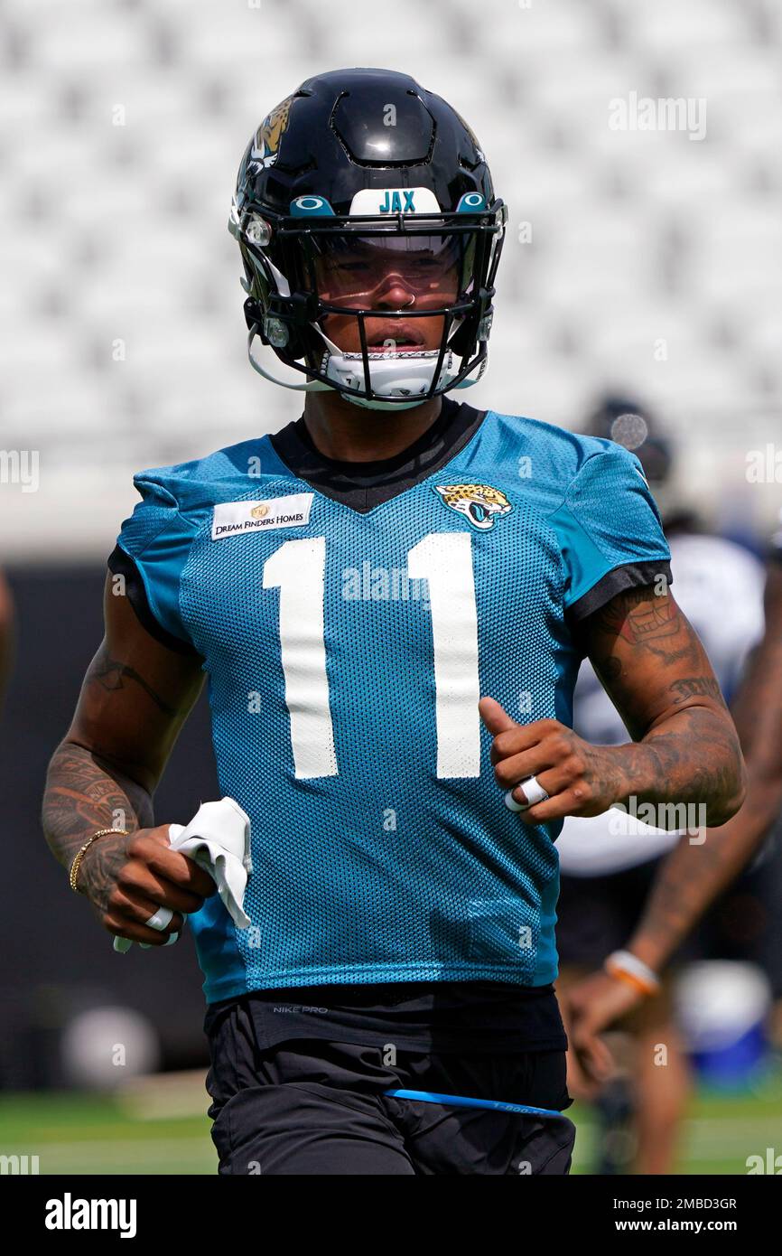 Jacksonville Jaguars wide receiver Marvin Jones (11) warms up at an NFL football practice