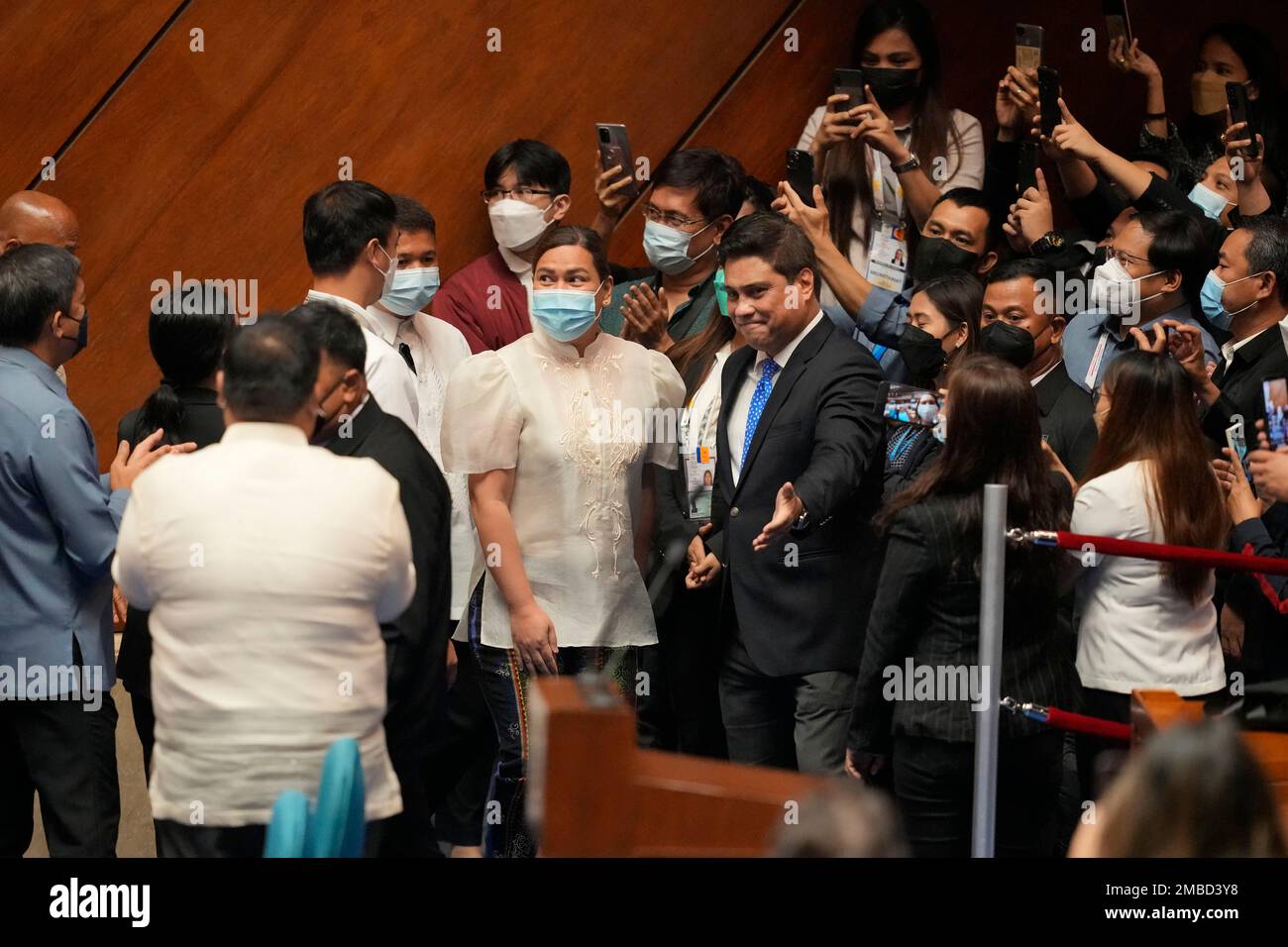 Vicepresidentelect Sara Duterte, center, arrives for her proclamation