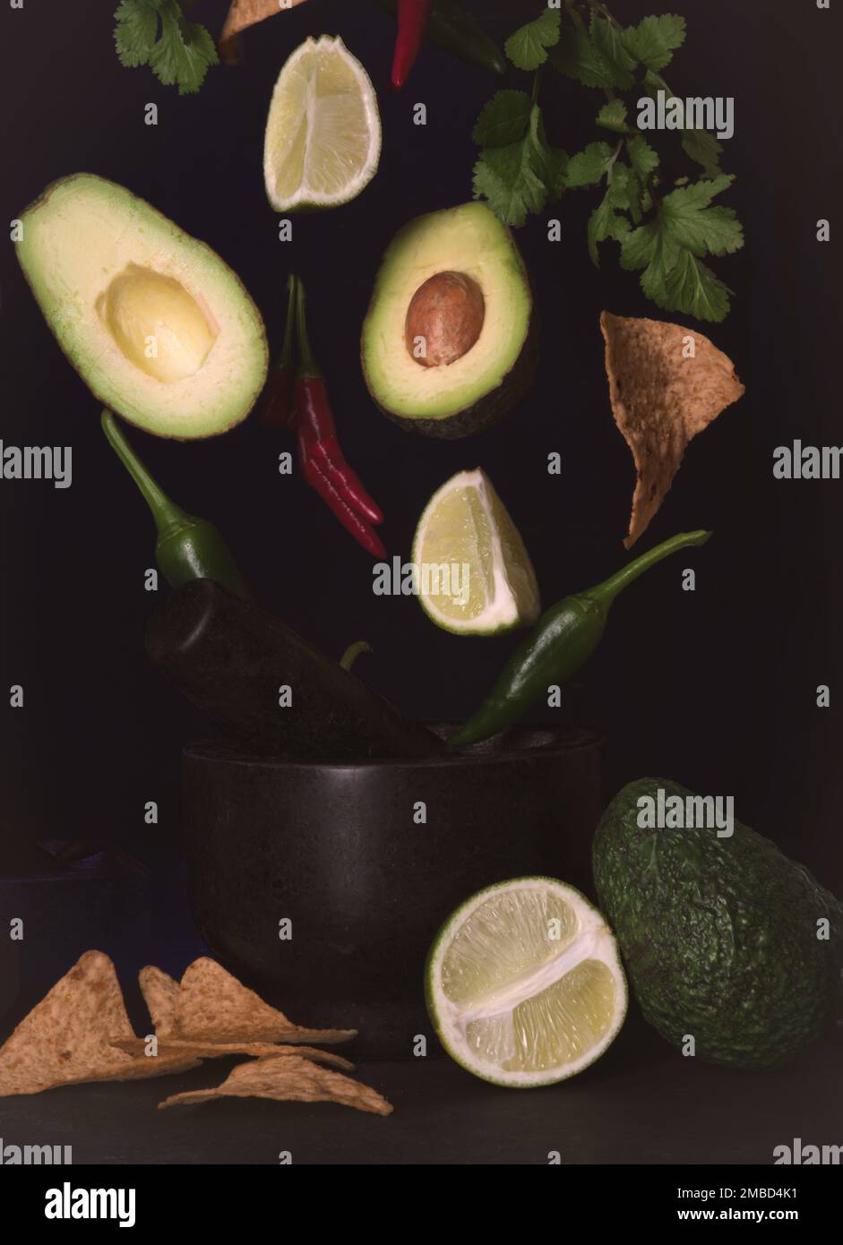 photograph-of-guacamole-ingredients-falling-from-the-sky-with-a-hi-res