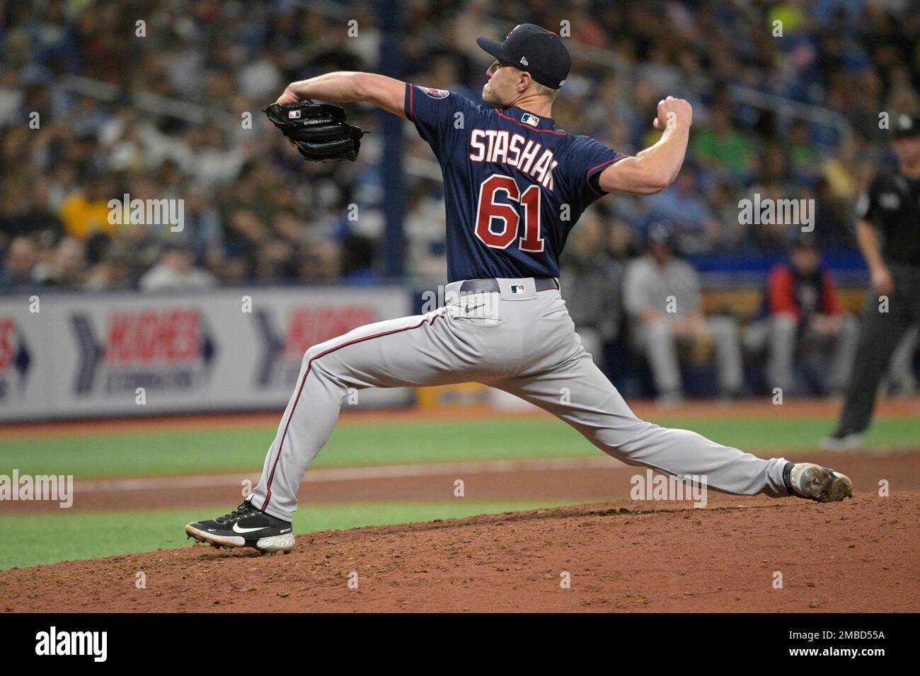 Minnesota Twins relief pitcher Cody Stashak (61) throws from the mound  during the fifth inning of a baseball game against the Tampa Bay Rays,  Saturday, April 30, 2022, in St. Petersburg, Fla. (