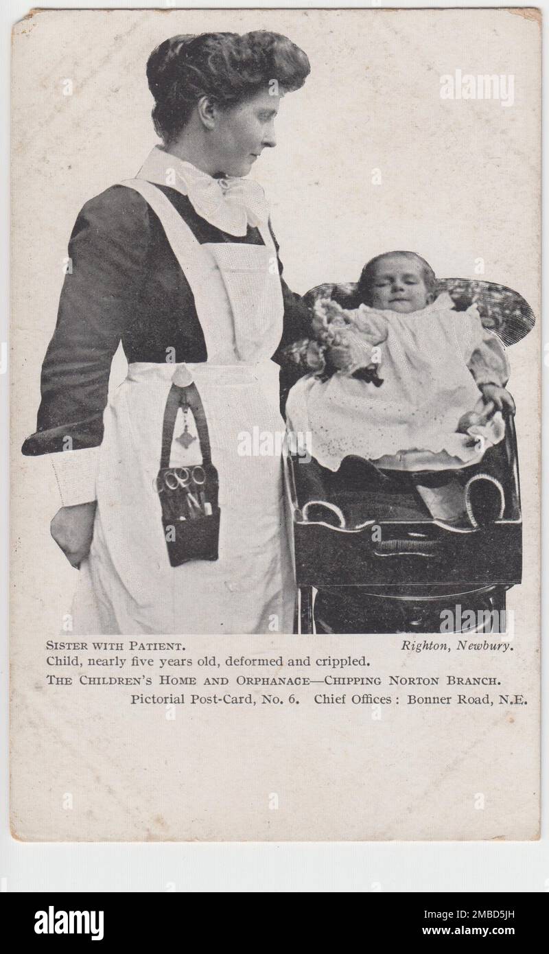 The Children's Home and Orphanage, Chipping Norton Branch: 'Sister with patient. Child nearly five years old, deformed and crippled': fundraising postcard showing a children's home nurse with a young girl  in a small traylike cot Stock Photo