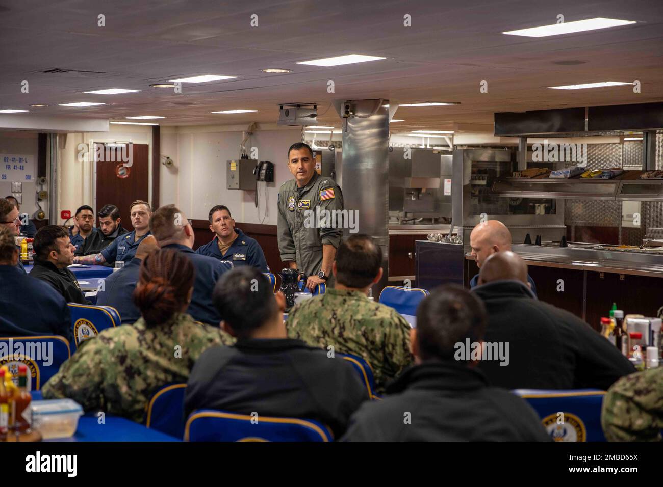SAN DIEGO (June 14, 2022) – Capt. Tony Chavez, commanding officer of amphibious assault ship USS Makin Island (LHD 8), holds a CO’s call with first class petty officers, June 14. Captains conduct CO’s calls to address the crew, relay pertinent information and answer questions about various command topics. Makin Island is a Wasp-class amphibious assault ship homeported in San Diego. Stock Photo