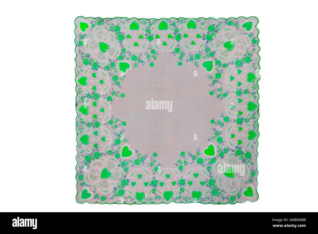 Isolated square green vintage hanky handkerchief for St Patricks Day or March or springtime. Hearts and flowers make scalloped border. Stock Photo
