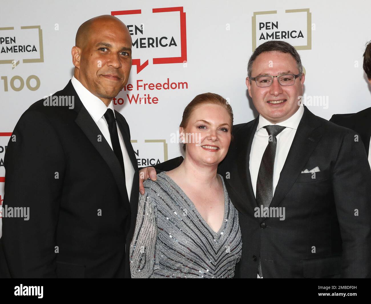 U.S. Sen. Cory Booker, DN.J., from left, Rachel Vindman and retired