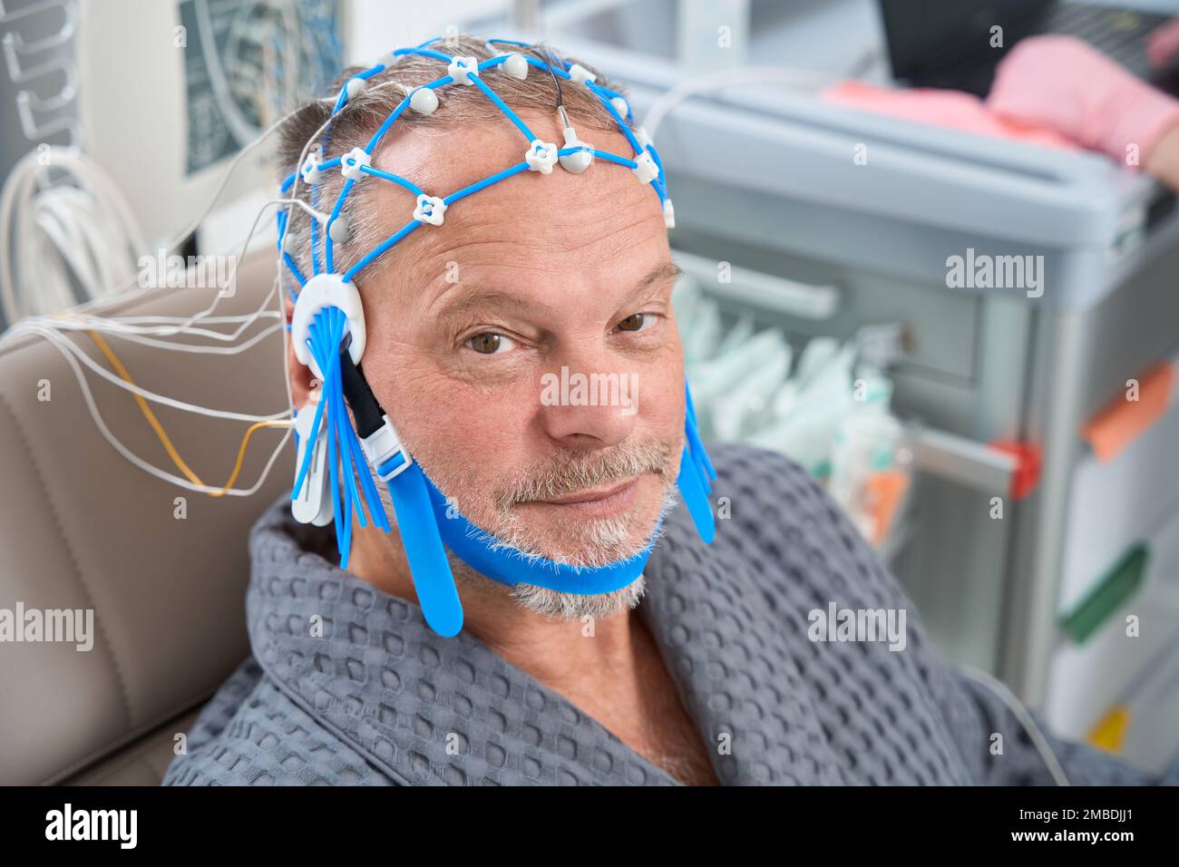 Elderly patient on the diagnostic EEG encephalography procedure Stock Photo