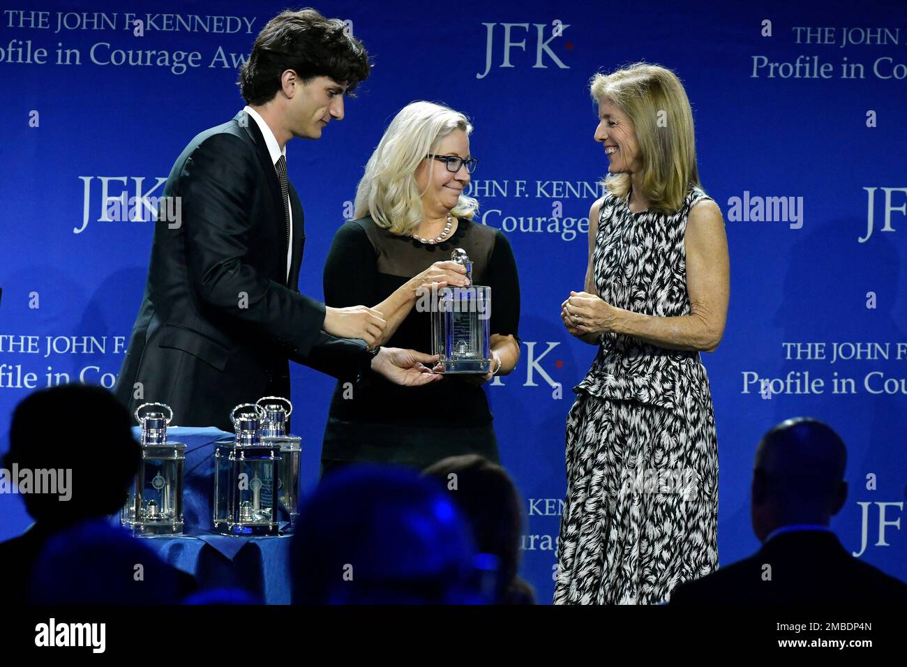 U.S. Rep. Liz Cheney, RWyo., center, stands with Jack Schlossberg