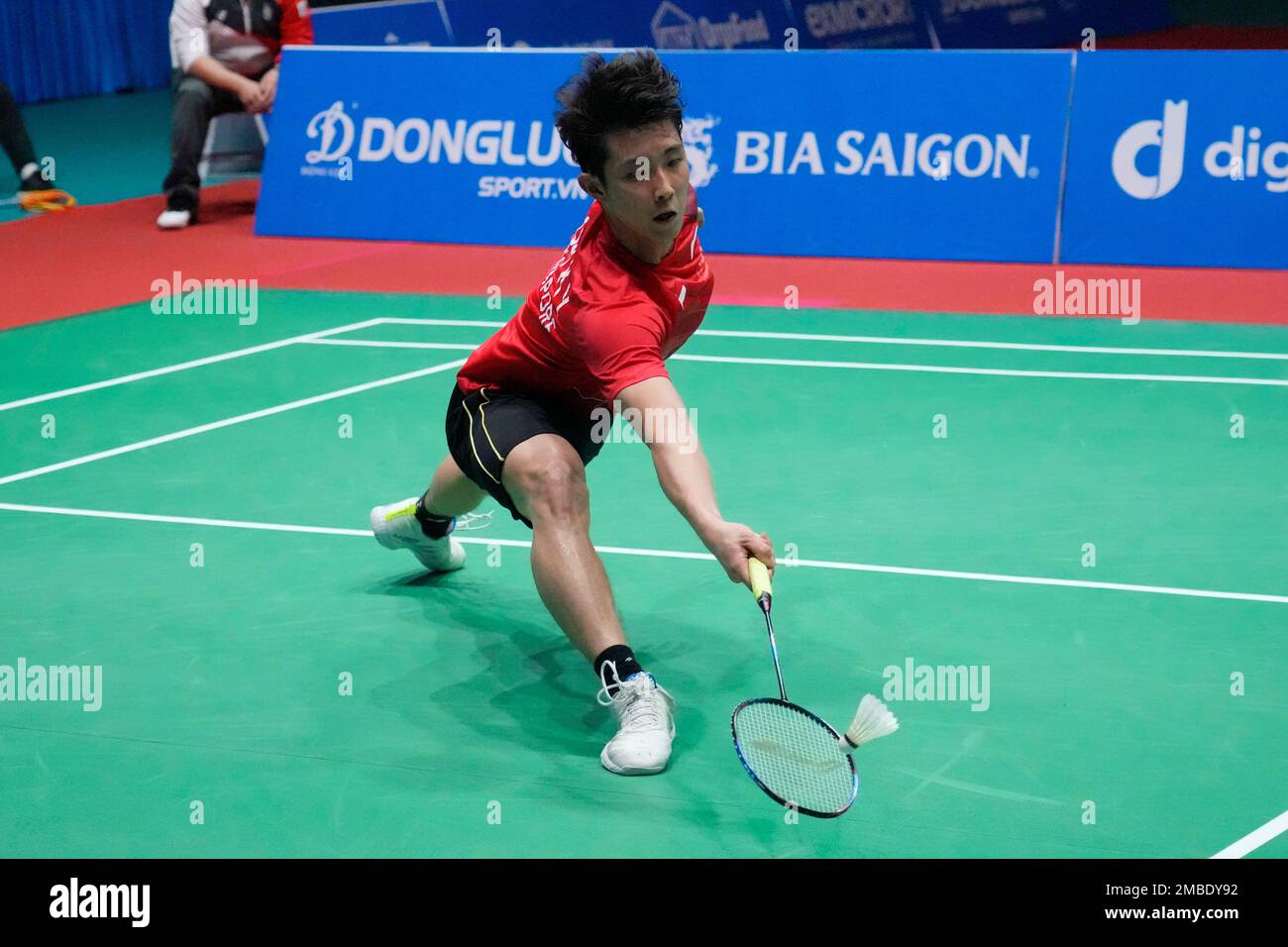 Singapores Loh Kean Yew competes against Thailands Kunlavut Vitidsarn during their mens singles badminton final match at the 31st Southeast Asian Games (SEA Games) in Bac Giang, Vietnam, Sunday, May 22, 2022