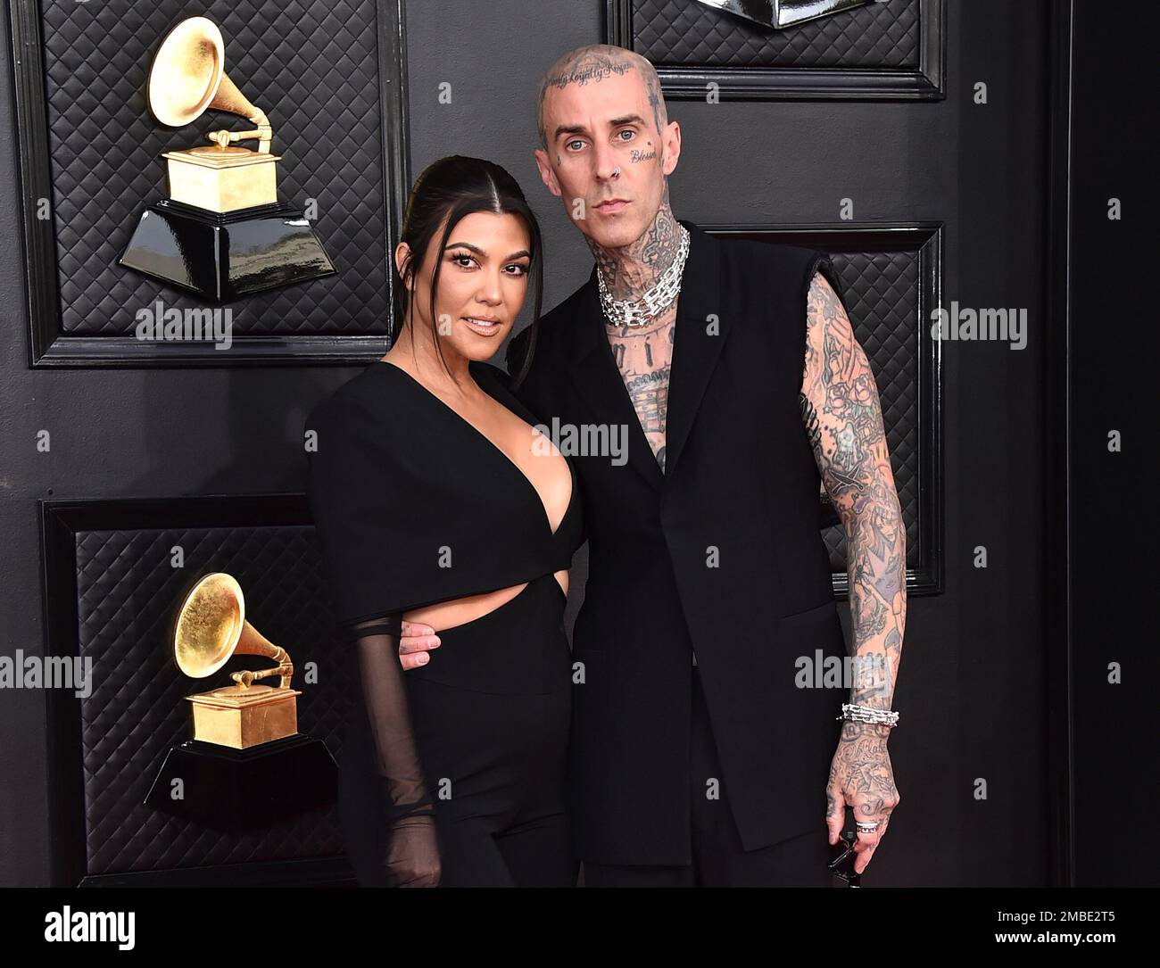 FILE Kourtney Kardashian, left, and Travis Barker appear at the 64th