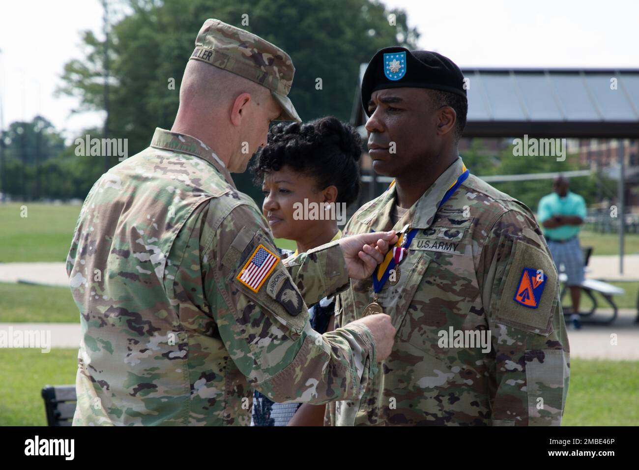U.S. Army Col. Jake Miller, 128th Aviation Brigade commander, presents Lt. Col. Steven Conrad, 1st Battalion, 222d Aviation Regiment, with the Meritorious Service Medal during a ceremony June 15, 2022 at Fort Eustis, Virginia Stock Photo