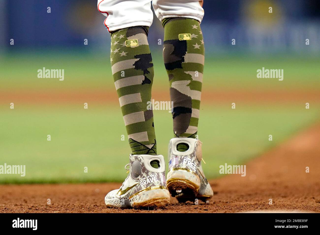 Miami Marlins' Jazz Chisholm Jr. wears camouflage socks on MLB Armed Force  Day honoring members of the U.S. military during the fifth inning of a  baseball game against the Atlanta Braves, Friday