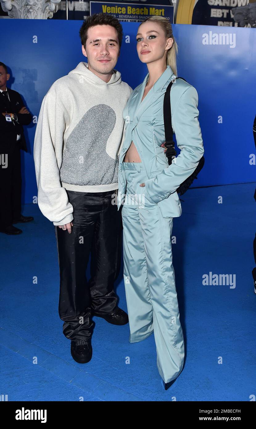 Brooklyn Peltz Beckham, left, and Nicole Peltz Beckham attend Dior Men