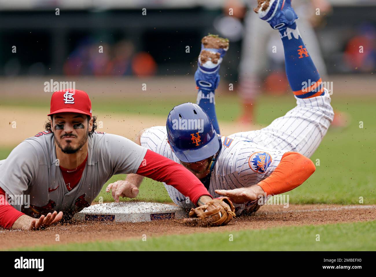St. Louis Cardinals third baseman Nolan Arenado tags out New York Mets