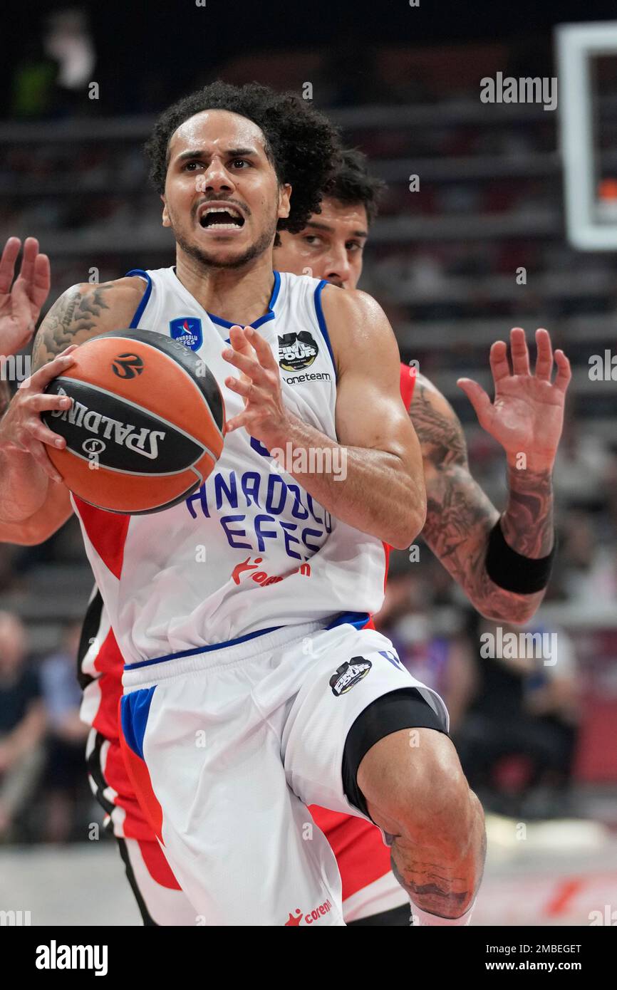 Anadolu Efes' Shane Larkin, right, drives to the basket as during a Final  Four Euroleague semifinal basketball match between Olympiacos and Anadolu  Efes, in Belgrade, Serbia, Thursday, May 19, 2022. (AP Photo/Darko