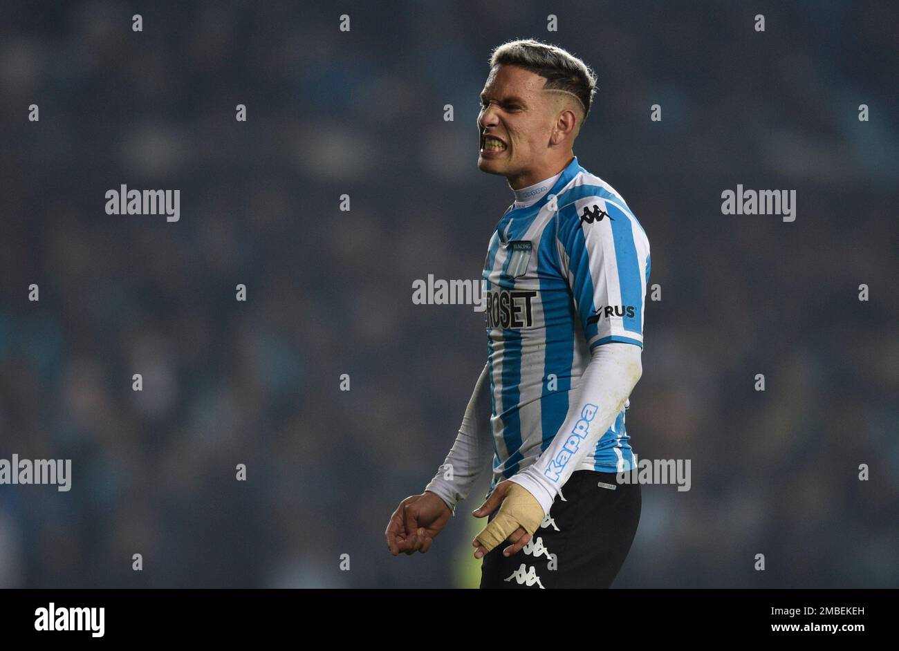 Enzo Copetti of Argentina's Racing Club, back, and Horacio