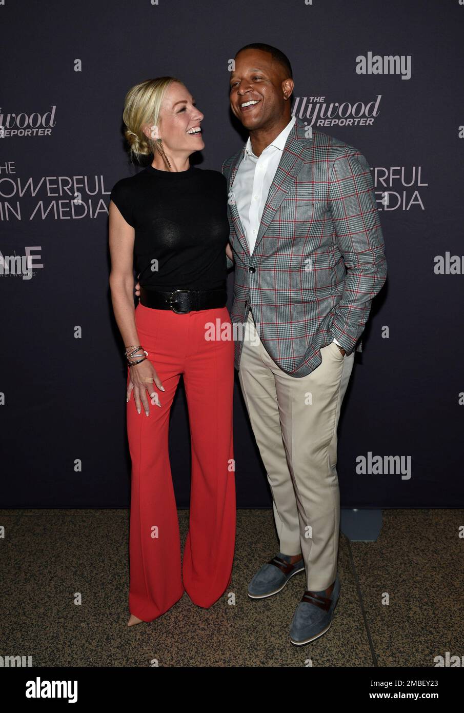 Craig Melvin, right, and wife Lindsay Czarniak attend The Hollywood