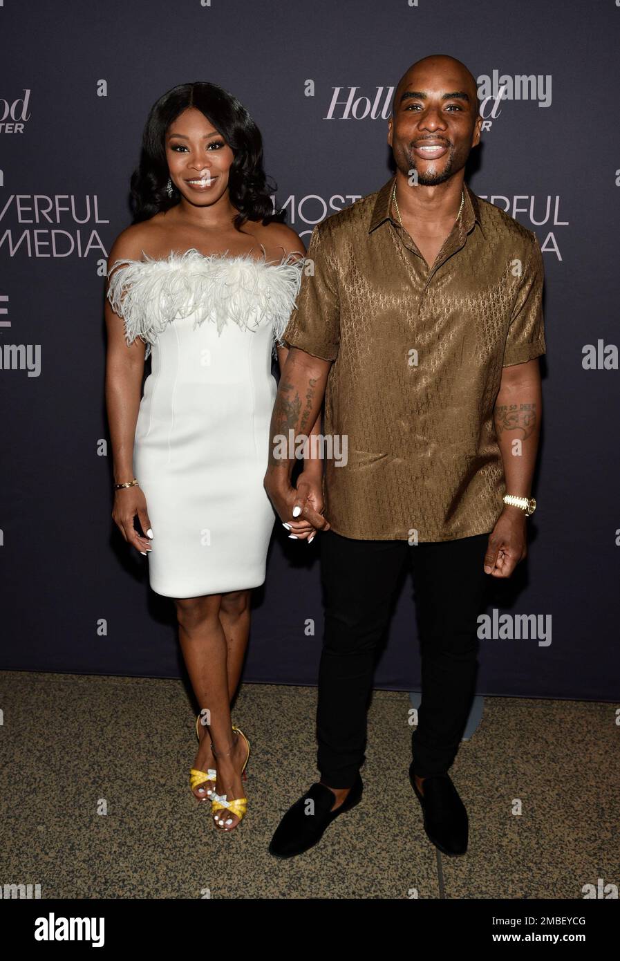 Charlamagne tha God, right, and wife Jessica Gadsden attend The