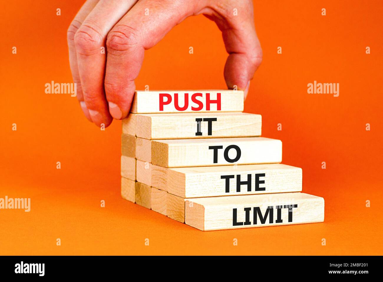 Push it to the limit symbol. Concept words Push it to the limit on wooden blocks. Beautiful