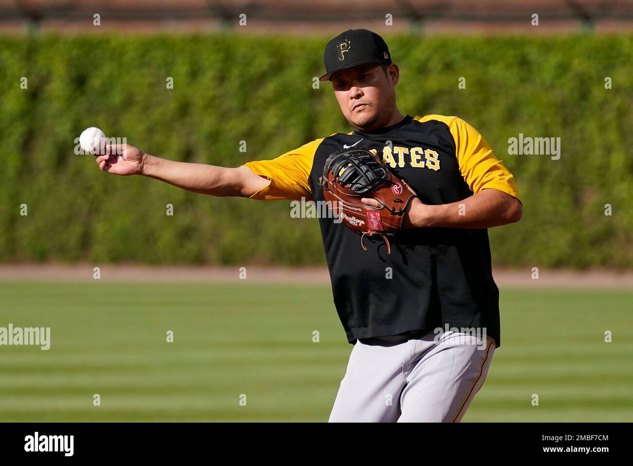 Pittsburgh Pirates first baseman Yoshi Tsutsugo takes infield practice  before a baseball game against the Chicago Cubs Monday, May 16, 2022, in  Chicago. (AP Photo/Charles Rex Arbogast Stock Photo - Alamy