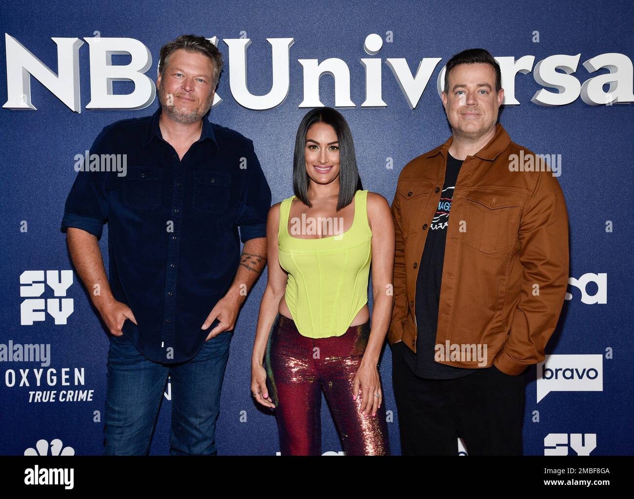 Blake Shelton, from left, Nikki Bella and Carson Daly attend NBCUniversal's  2022 Upfront press junket at the Mandarin Oriental Hotel on Monday, May 16,  2022, in New York. (Photo by Evan Agostini/Invision/AP