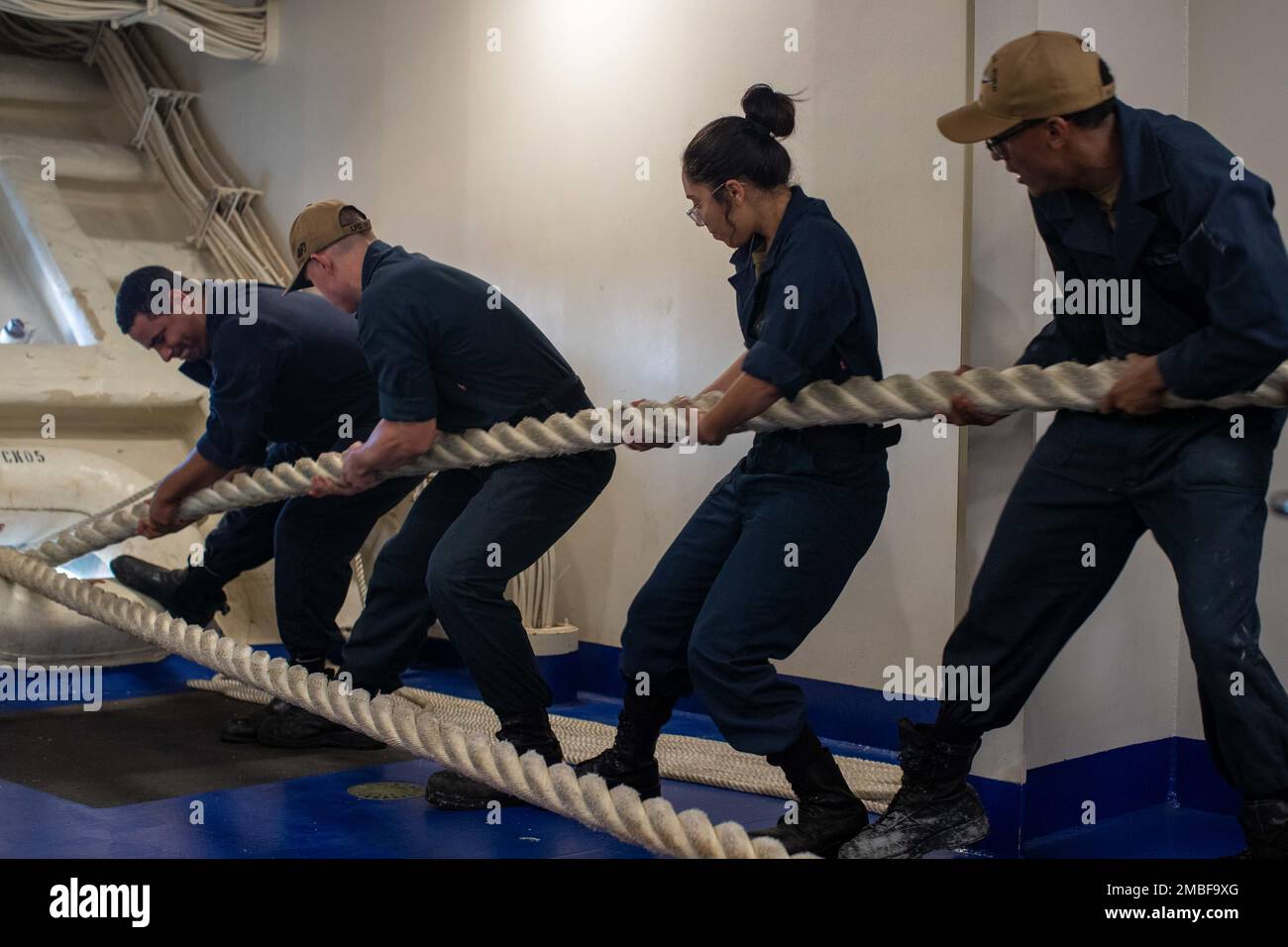Sailors assigned to USS Gerald R. Ford’s (CVN 78) deck department heave ...