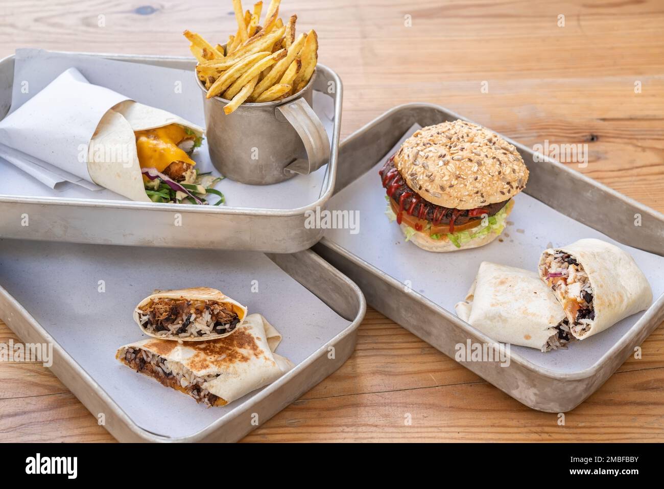 Set of different fast food snacks from burger burrito wrap and fried