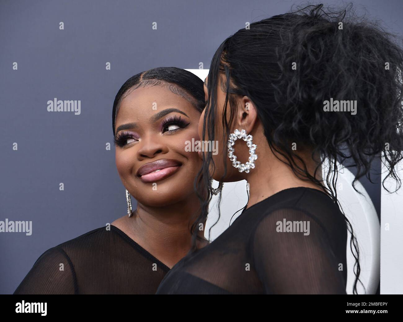 Jt And Yung Miami JT, left, and Yung Miami of City Girls arrive at the Billboard Music