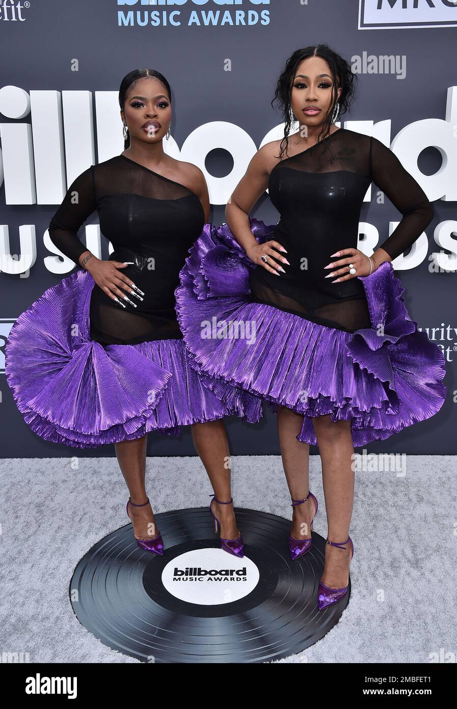 Jt And Yung Miami JT, left, and Yung Miami of City Girls arrive at the Billboard Music